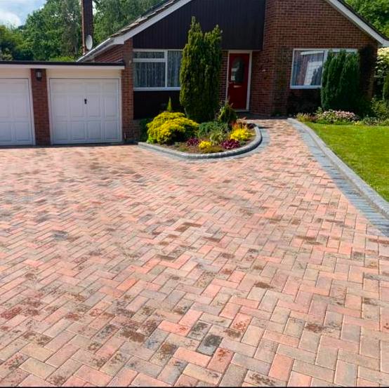 Grand Designs Paving Surrey Ltd at work